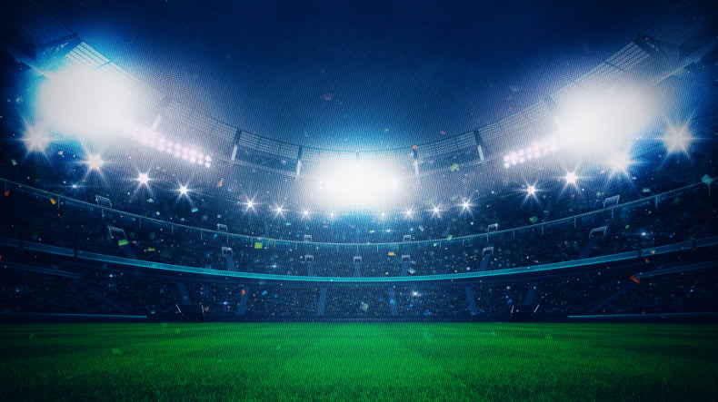Football pitch under lights representing Boomerang Bet football betting markets